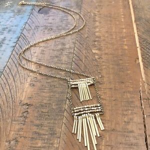 Long gold modern necklace!